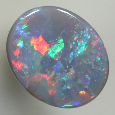 SOLID SEMI BLACK OPAL Red sparkles amongst green